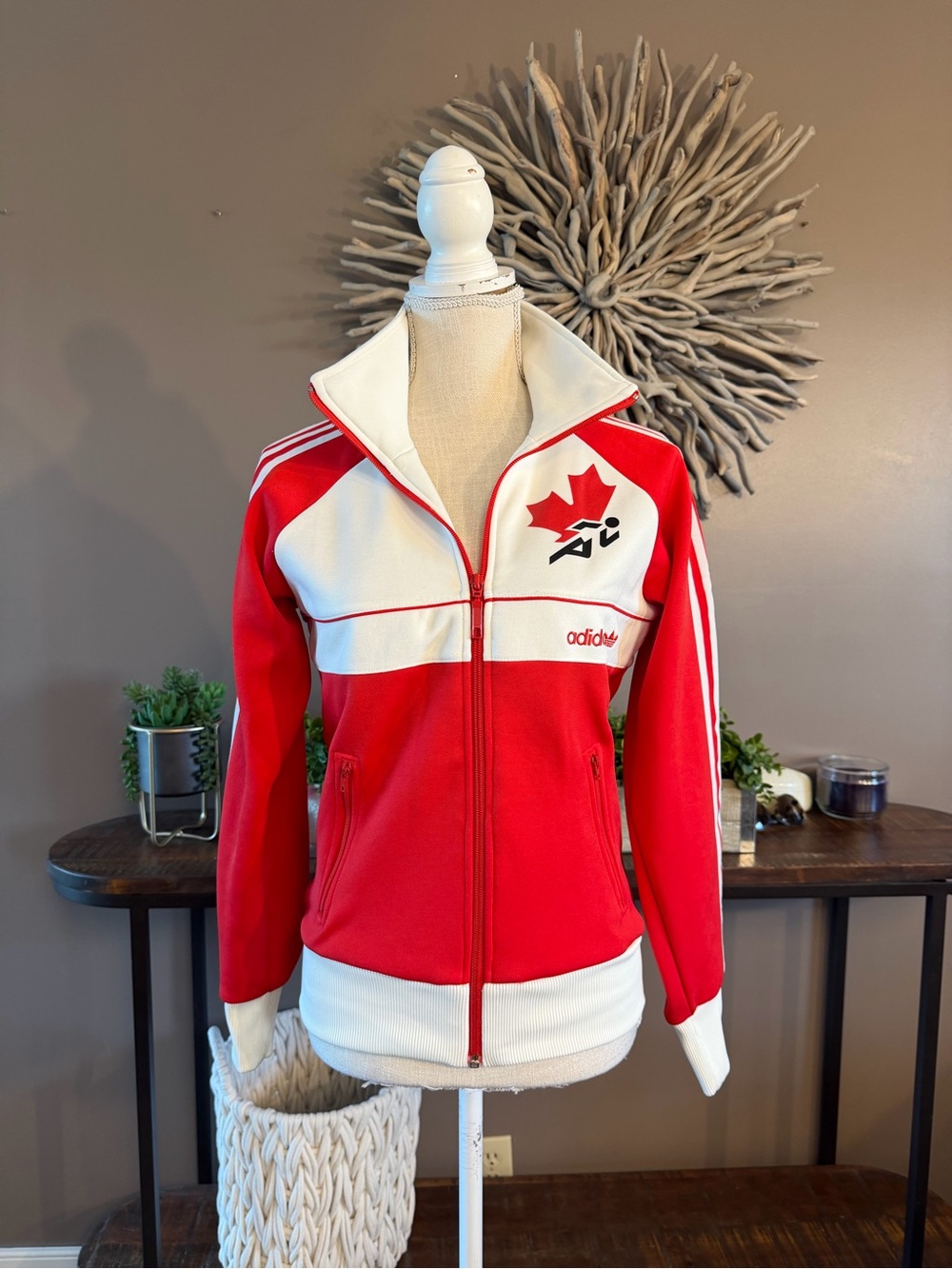 vintage Adidas Canada track jacket featuring the iconic red maple leaf logo